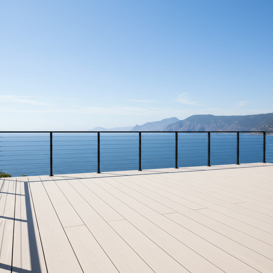 A modern deck with nearly invisible black cable railing and wide unobstructed ocean or mountain views.