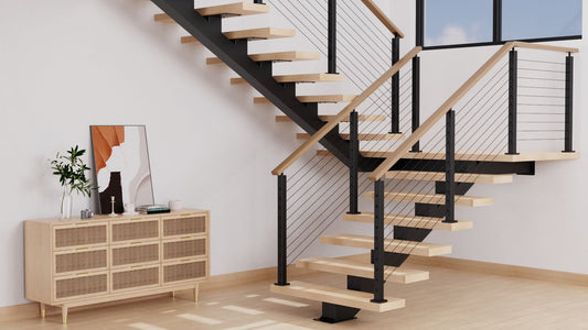 Modern floating staircase with light wood treads, black steel stringers, and cable railing in a bright interior