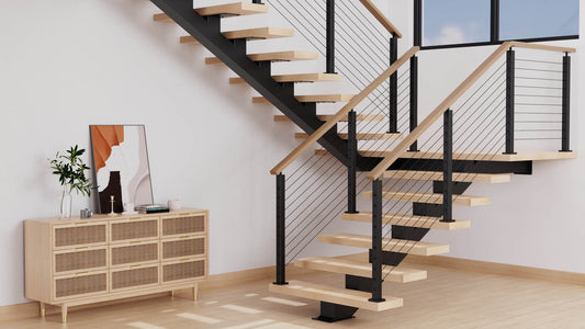 Steel mono stringer floating stairs with wood treads and cable railing in a modern switchback layout