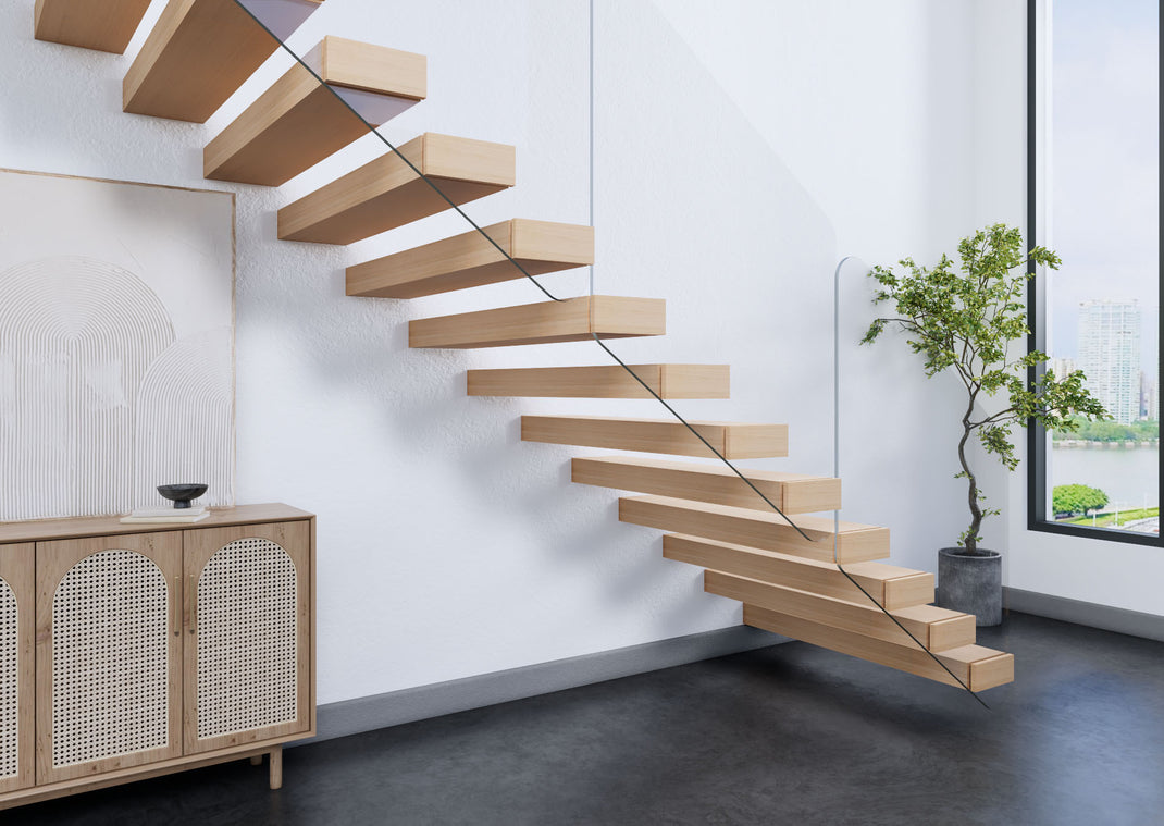Wood cantilever stair treads projecting from a white wall with a slim diagonal guard detail.