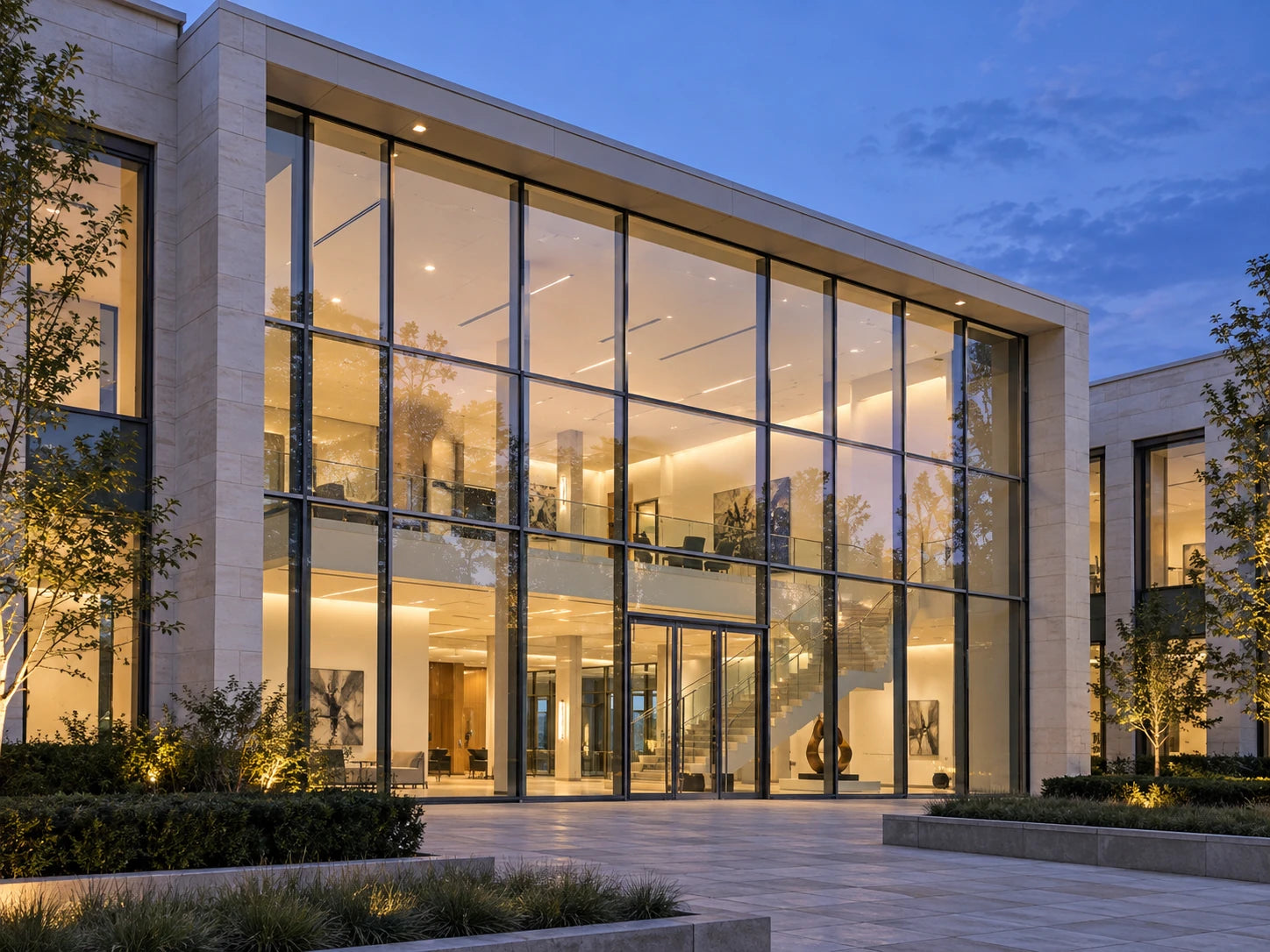 Illustrative two-story commercial aluminum curtain wall with a glazed atrium